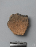 複合印紋夾砂陶腹片